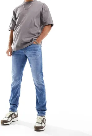 Jack & Jones glenn slim tapered fit jeans in mid blue wash