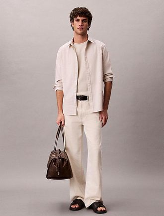 Calvin Klein Camisa con botones Oxford cl&aacute;sica de color liso