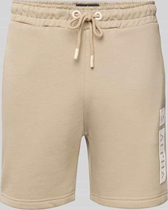 Alpha Industries Alpha Industries Sweatshorts mit elastischem Bund und Tunnelzug in Sand, Gr&ouml;&szlig;e XS