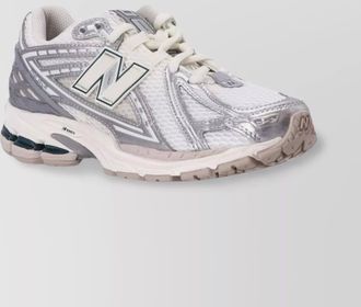 New Balance paneled low-top sneakers