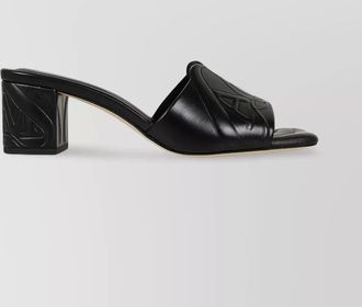 Alexander McQueen leather logo-embossed heeled mules
