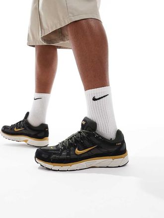 Nike P-6000 - Sneakers unisex nere e oro-Nero