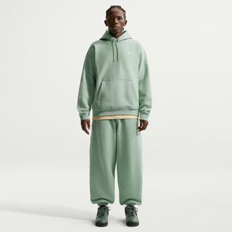 Nike Mens Solo Swoosh Cuffed Fleece Pants in Green | HV1088-006