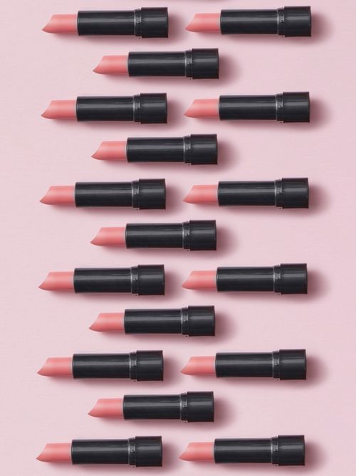 best beauty gifts of 2022, pink lipsticks in black cases on pink background