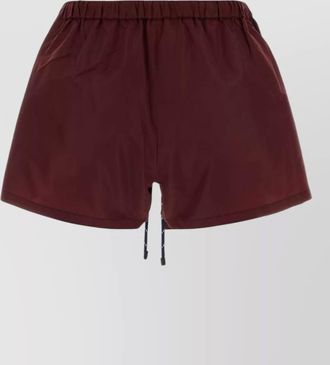 Miu Miu tailored shorts featuring functional side pockets