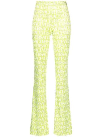 Versace Pantaloni svasati con stampa - Verde