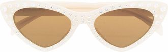 Moschino Zonnebril met cat-eye montuur - Beige