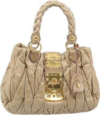 Miu Miu Coffer Convertible Satchel Matelasse Leather Beige Leather Handbag (Pre-Owned)