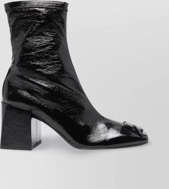 Courr&egrave;ges block heel ankle boots with crease effect