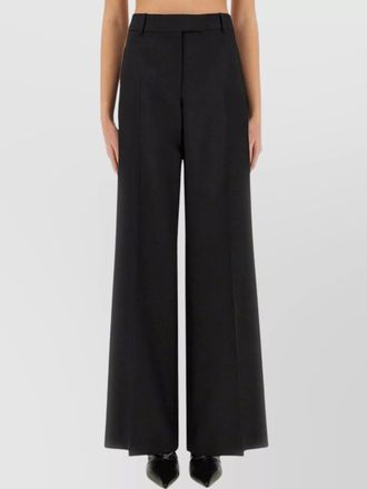 Alexander McQueen trousers with stripes on the side