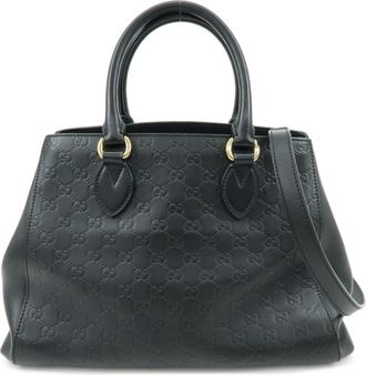 Gucci Soft Signature Convertible Top Handle Guccissima Leather Black Leather Handbag (Pre-Owned)