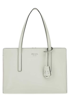 トートバッグ PRADA WHITE LEATHER SHOPPING BAG Prada logo-perforated Leather Tote Bag | White | FARFETCH