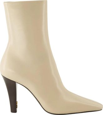 Saint Laurent Jil Enkellaarsjes met Hak - Dames - Laarzen met Hak - Beige - 38 EU - Leer - Schoenen