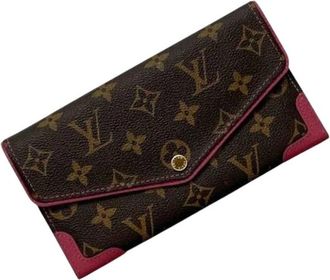 Louis Vuitton Pre-owned Lange portemonnee (bi-fold) - Dames - Vintage Accessoires - Bruin - ONE Size - Vintage