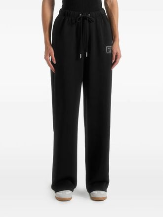 Mani&egrave;re De Voir Avery logo-patch track pants - unisex - Neoprene - S - Black