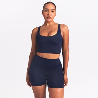 Nike Womens SKIMS Shine Scoop-Neck Bra Top in Blue | BRSPT5149W-NVY