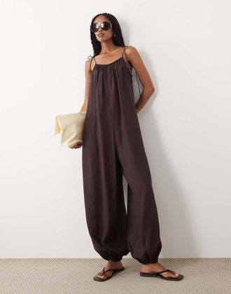 Arket Tuta jumpsuit da spiaggia marrone cioccolato con gamba a palloncino