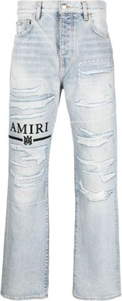 Amiri logo-embroidery ripped jeans - men - Cotton - 29 - Blue