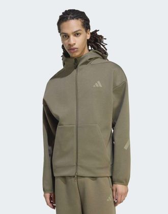 adidas Z.N.E. - Top sportivo verde oliva con zip