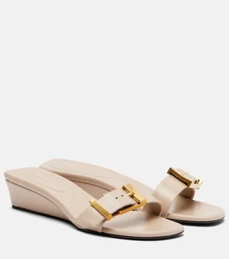 Khaite Mules Manhattan in pelle con zeppa