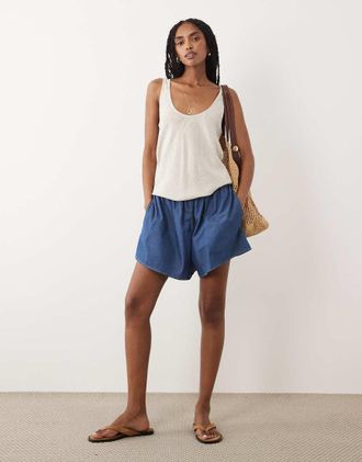 Arket Pantaloncini di jeans blu lavaggio medio