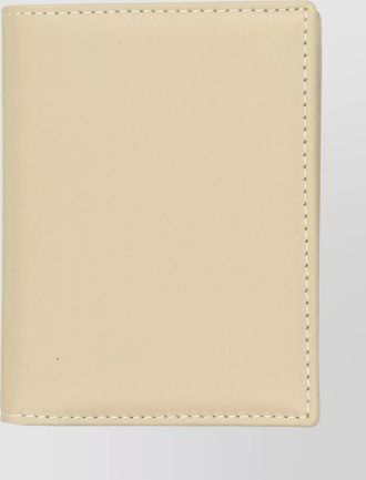Comme Des Garçons bi-fold leather cardholder compact design