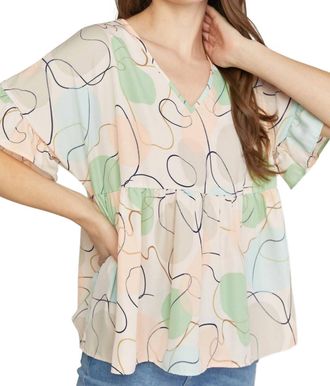 Entro Abstract Peplum Top In Peach