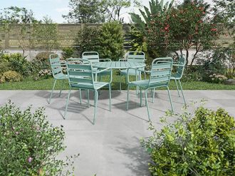 Vente-Unique Sala da pranzo da giardino in metallo - un tavolo rotondo D.130cm e 6 sedie impilabili - Verde acqua - MIRMANDE di MYLIA