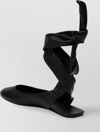 The Attico wrap ankle flat sole open back round toe