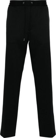 Moncler logo-patch drawstring tapered trousers - men - Elastane/Polyamide - 44 - Black