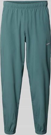 Nike Form Pants mit Logo-Print und Eingriffatschen in Petrol, Gr&ouml;&szlig;e XXL