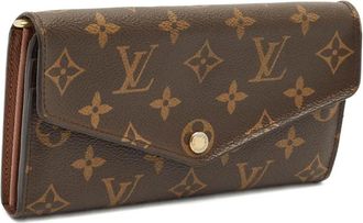 Louis Vuitton Sarah portemonnee met monogram - Bruin