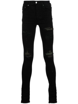 Amiri ripped-detail denim jeans - Black