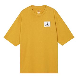Nike Jordan Mens Air Jordan FW22 Logo Label Loose Round Neck Short Sleeve Yellow T-Shirt DZ0605-712