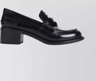 Miu Miu block heel penny loafers