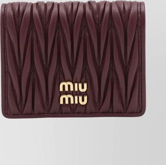 Miu Miu quilted texture purses & cardholders