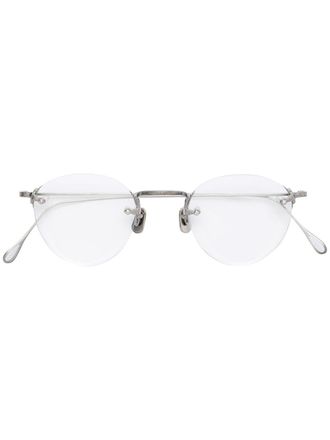 Eyevan 7285 Occhiali 140 tondi con montatura a giorno - Effetto metallizzato