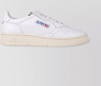 Autry low sneaker with perforated detailing and rubber sole