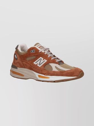 New Balance casual sneakers with mesh and suede design