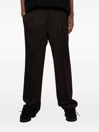 Dr&ocirc;le de Monsieur pinstripe trousers - men - Wool/Viscose/Polyester/Elastane - L - Brown
