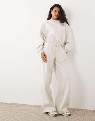 New Balance pantaloni sportivi Trackside in pile beige-Bianco