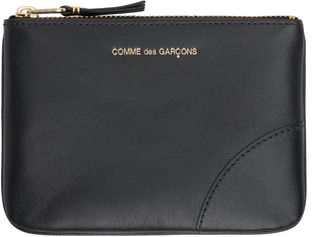 Comme Des Garçons Huge Logo Wallet Accessories from $203.00