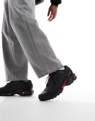 Nike Air Max Plus Drift sneakers in black and red