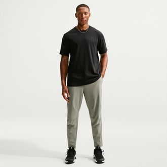Nike Mens Unlimited Dri-FIT Zippered Cuff Versatile Pants in Green | FB7548-320