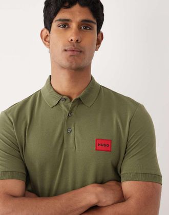 HUGO BOSS HUGO Red - Polo slim verde con riquadro rosso sul petto