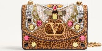 Valentino Garavani Valentino Garavani Vain embroidered shoulder bag in pony-effect calfskin. Wo