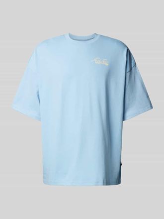 Karl Kani T-Shirt mit Label-Details in Hellblau, Gr&ouml;&szlig;e XS