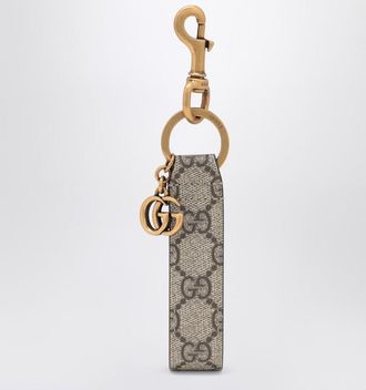 Gucci Ophidia keychain in GG Supreme fabric beige