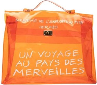 Herm&egrave;s Pre-owned Handbags, female, Orange, Size: ONE SIZE Pre-owned Vinyl Kelly Handbag