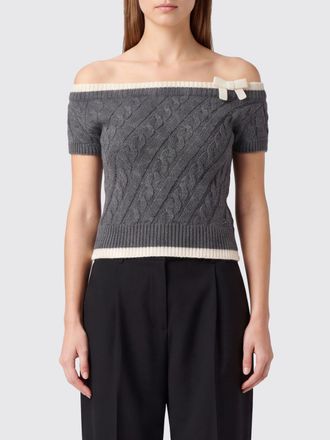 Shushu/Tong Top cropped in maglia di lana con fiocco e profili a contrasto